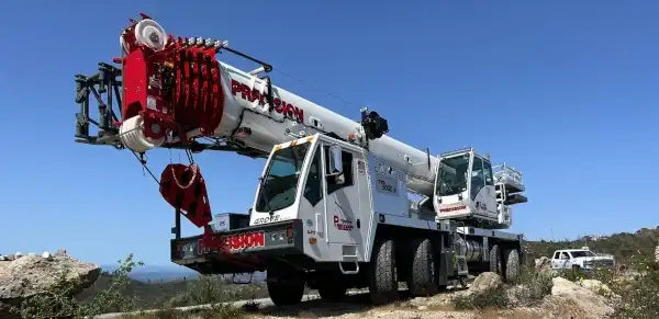 Our Grove TTS9000-2 110-ton crane showing off in mountain terrain